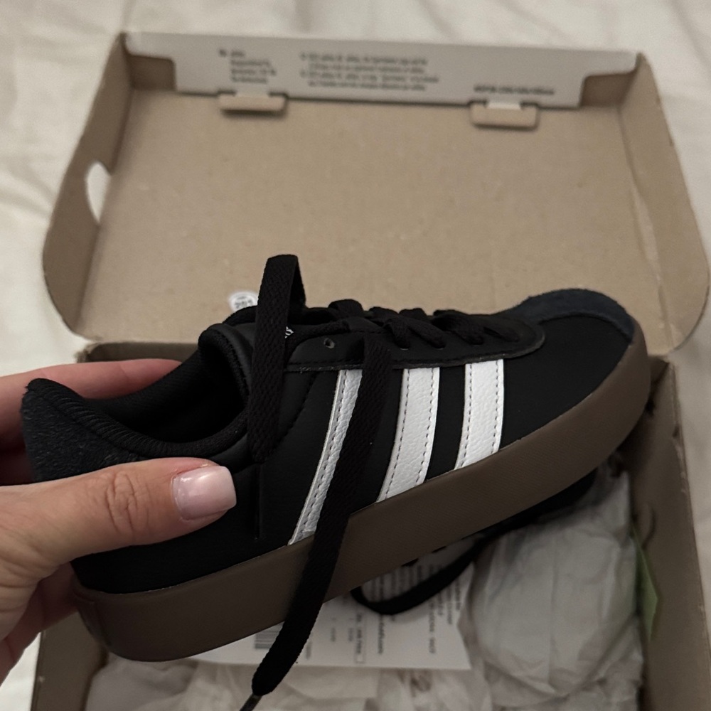 Adidas Black Sneakers with White Stripes and Brown Sole
